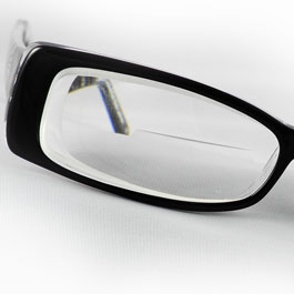 -10.00 power lenses with addition 12 diopters of prism base out O.U..