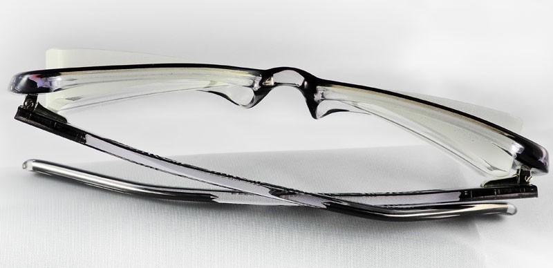 -10.00 power lenses with addition 12 diopters of prism base out O.U..
